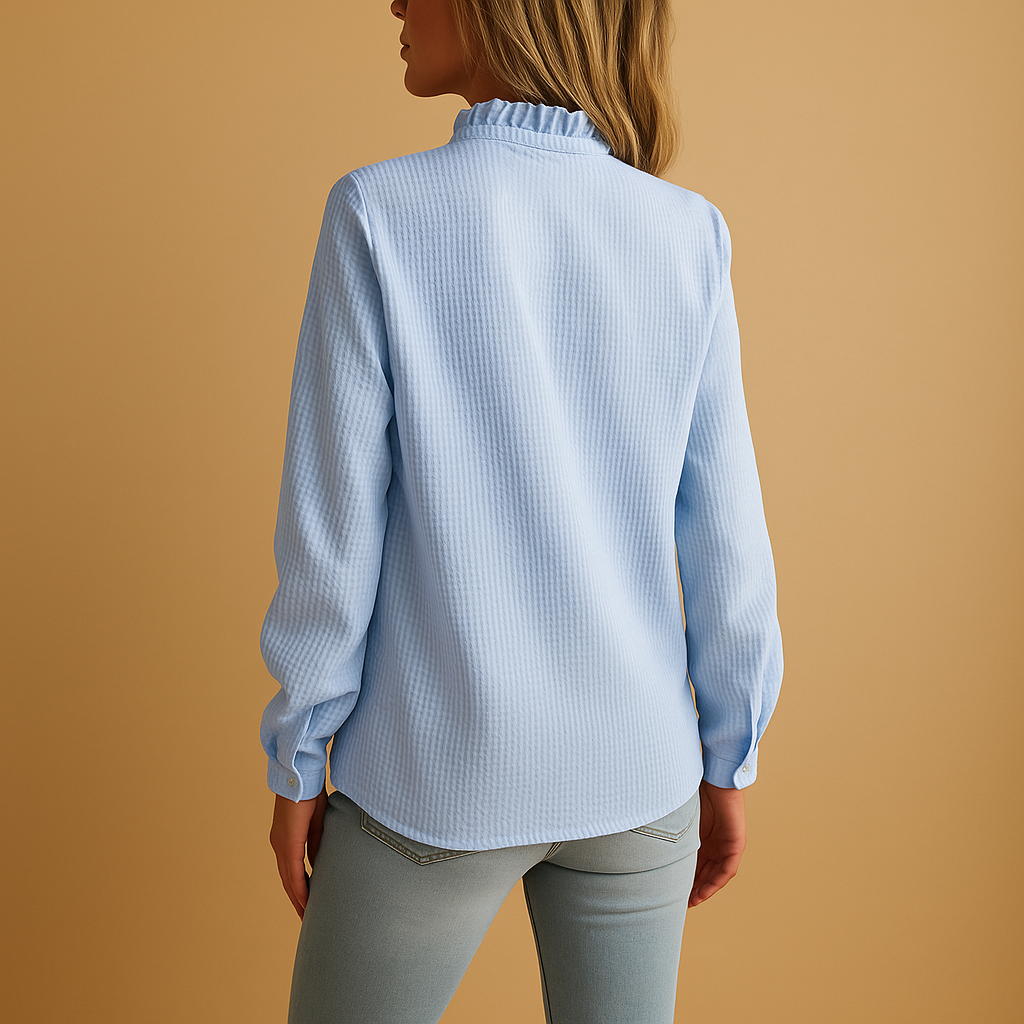 Tessa – Randig blus med volanger för damer